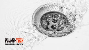 Water blocked from running down clogged drain.